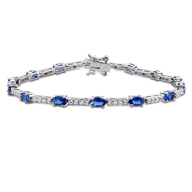 stylish digital watches with Bluetooth connectivity-Miadora Sterling Silver Created Blue and White Sapphire Tennis Bracelet