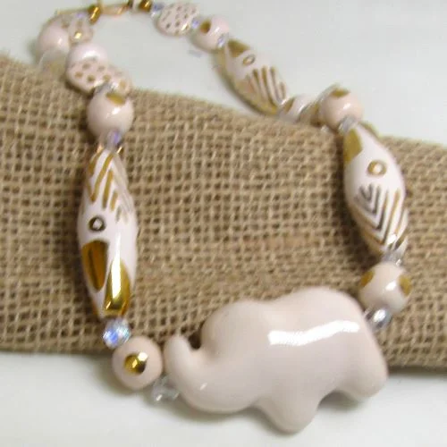 luxury pendant necklace with crystal charm-Kazuri  Necklace in White Chocolate and Gold Elephant Fair Trade