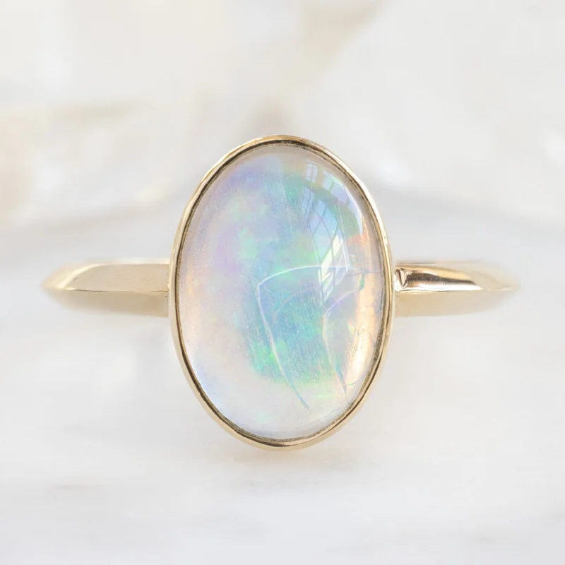 wedding bands for women with custom diamond settings-The Hazel Ring | 1.97ct Oval Opal in 14K Yellow Gold