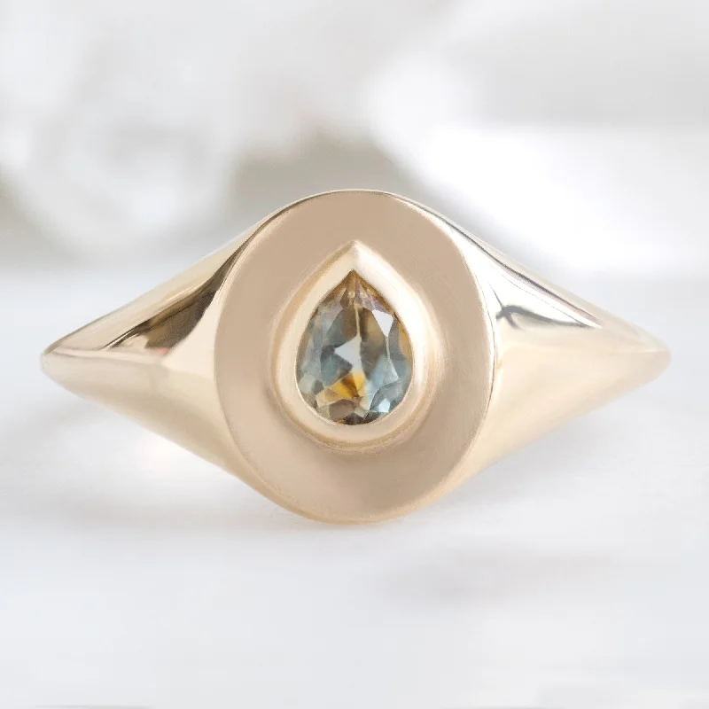 designer wedding rings-The Signet Ring | 0.60ct Pear Montana Sapphire in 10K Yellow Gold